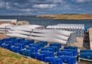 Power is flowing from the Shetland Isles to mainland Britain for the first time, thanks to the UK's most productive onshore windfarm, Viking, which has come on stream.