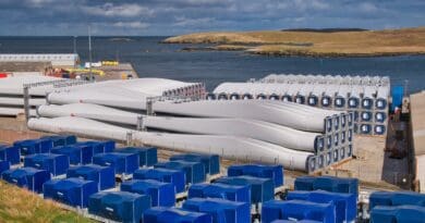 Power is flowing from the Shetland Isles to mainland Britain for the first time, thanks to the UK's most productive onshore windfarm, Viking, which has come on stream.