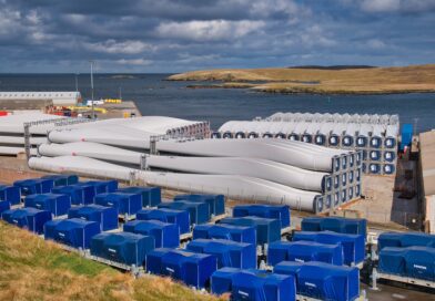 Power is flowing from the Shetland Isles to mainland Britain for the first time, thanks to the UK's most productive onshore windfarm, Viking, which has come on stream.